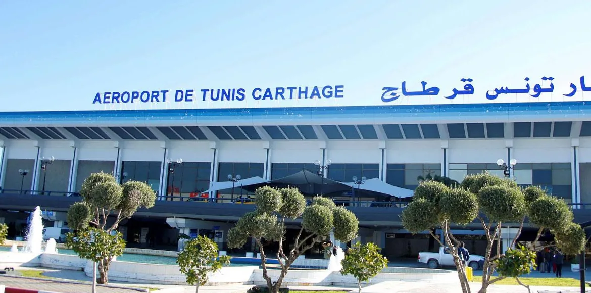 Terminal building facade of Tunis-Carthage Airport, showing the terminal signage and arrivals forecourt